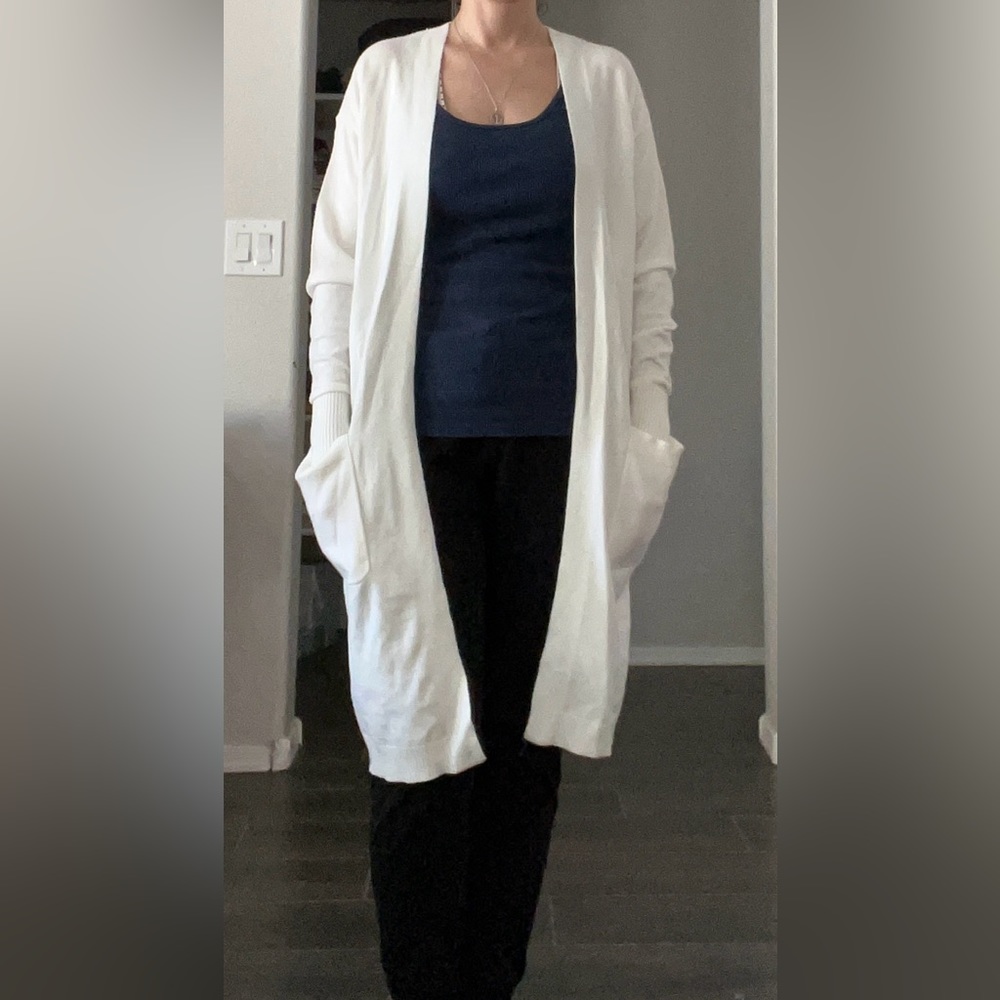 Express XS long cream colored pocket sweater